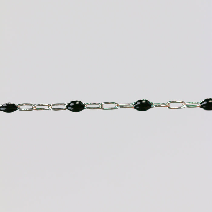 The silvia chain with black enamel on a gray background