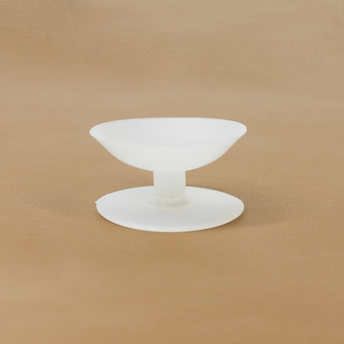 Shown is one of the bobbins/chain spools that is versatile for storing and keeping chains safe while being a great organizing tool for a permanent jewelry business.