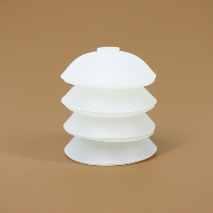 Seen is a stack of four of the protective bobbins that allow chain to be wrapped around them and stored effectively while still being easily accessible.