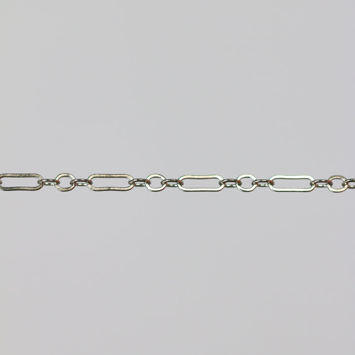 White gold cable chain with paperclip links on a gray background
