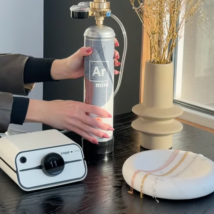 Mini argon tank with regulator and Sunstone permanent jewelry welder for mobile welding setup