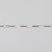 Solid white gold crinkled paperclip chain on a light gray background