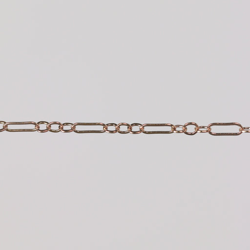 Solid gold paperclip cable chain on a gray background