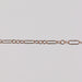 Solid gold paperclip cable chain on a gray background