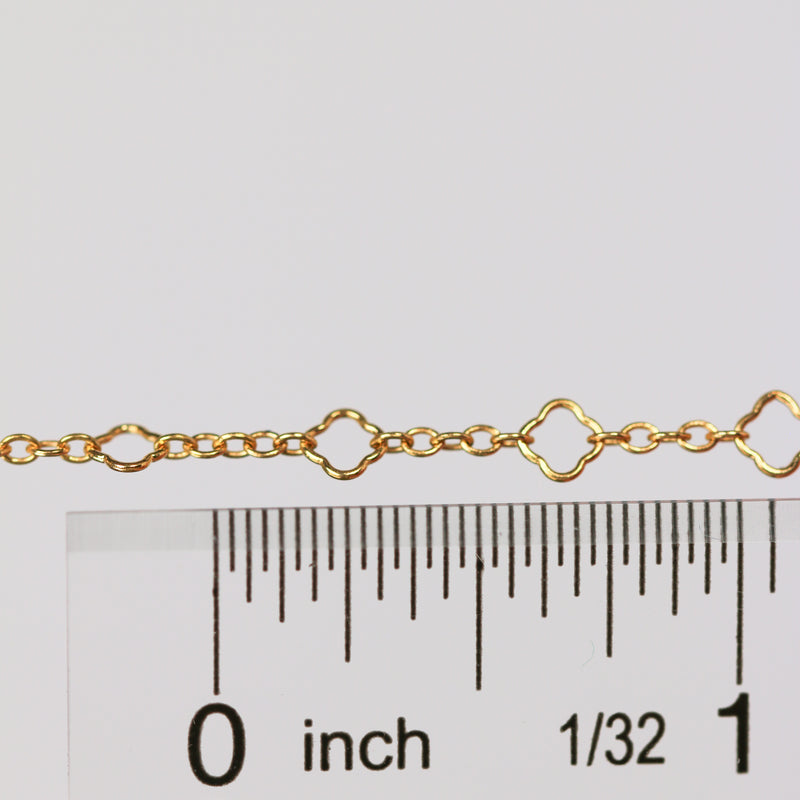 Alissa clover chain next to a ruler showing the size of the chain.