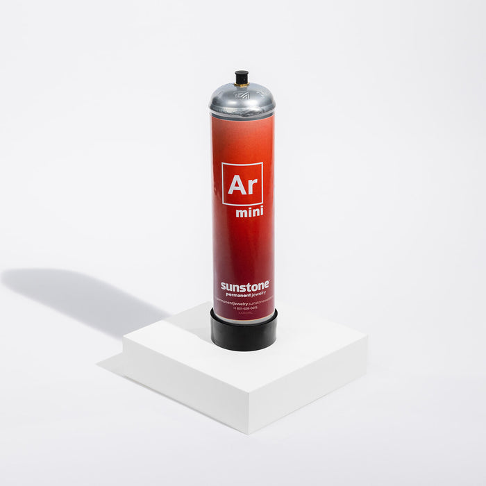 Lightweight small argon tank with sunstone® permanent jewelry branding on it