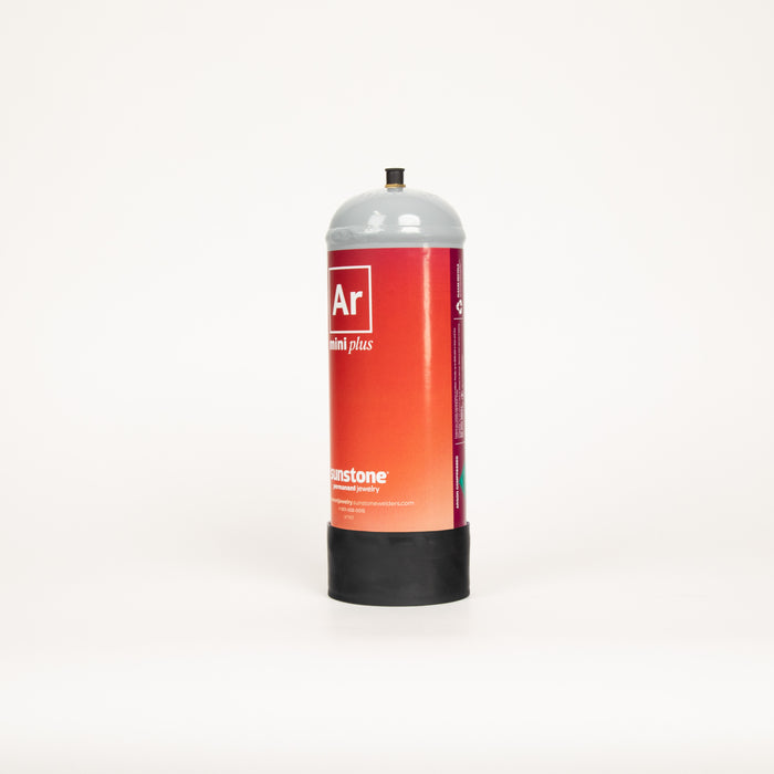Red argon gas cylinder with white label on a white background