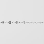 Shiny starburst links that catch the light perfectly. One detailed accent link with 3 links connecting them.