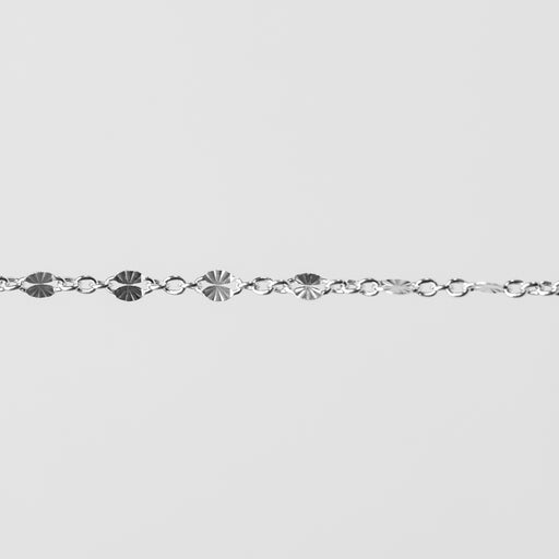 Shiny starburst links that catch the light perfectly. One detailed accent link with 3 links connecting them.