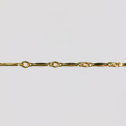 Dapped bar and link brittany chain in (GFY) on a light gray background