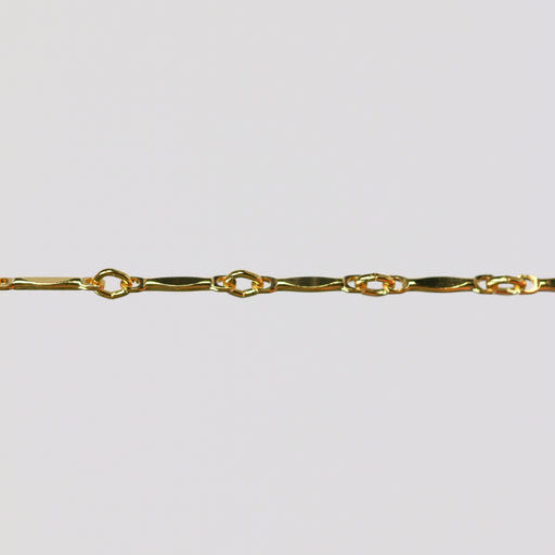 Dapped bar and link brittany chain in (GFY) on a light gray background