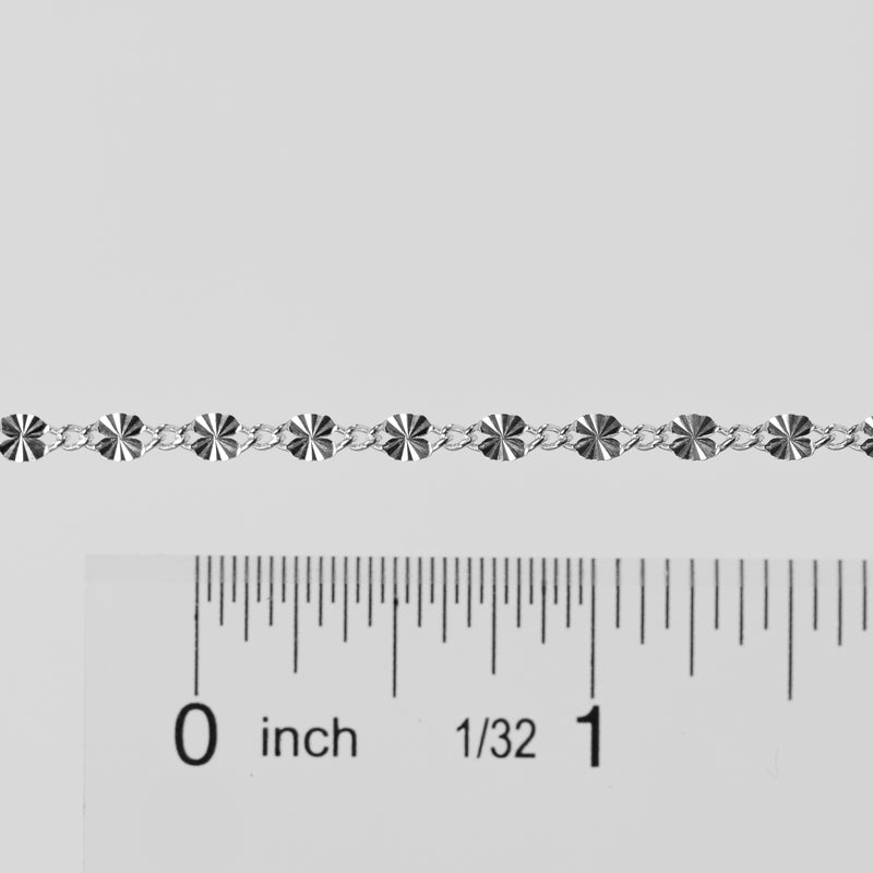 Ruler with measurement scale on a white background showings the sizes of the links on the Brynna Permanent Jewelry Chain