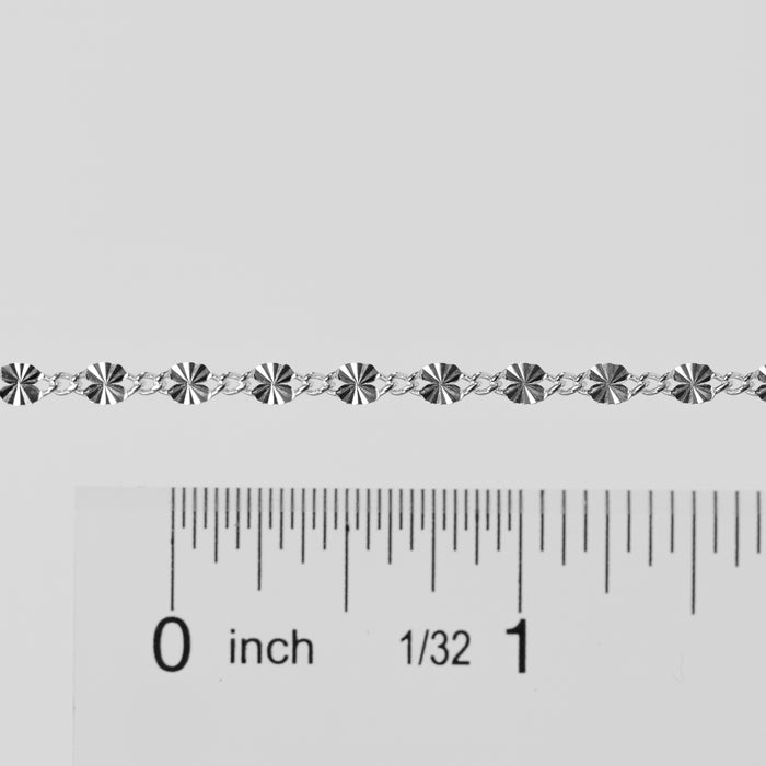 Ruler with measurement scale on a white background showings the sizes of the links on the Brynna Permanent Jewelry Chain