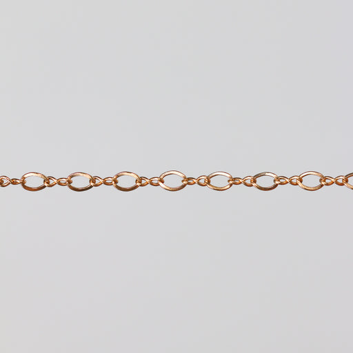 Yellow gold chain with twisted links to look like infinity symbols.