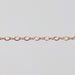 Yellow gold chain with twisted links to look like infinity symbols.