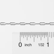 Silver chain with a ruler for measurement on a white background