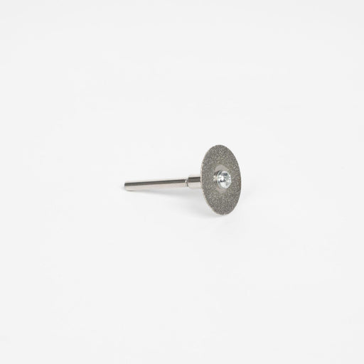 Pictured is a diamond disk on a little dremel attachment meant for sharpening permanent jewelry electrodes