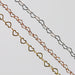 Three chains made from heart links in Yellow Gold, Rose Gold, and Sterling Silver