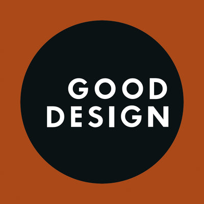 Black circle with 'GOOD DESIGN' text on a brown background