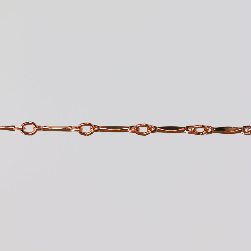 Rose gold dapped bar and link chain for permanent jewelry.