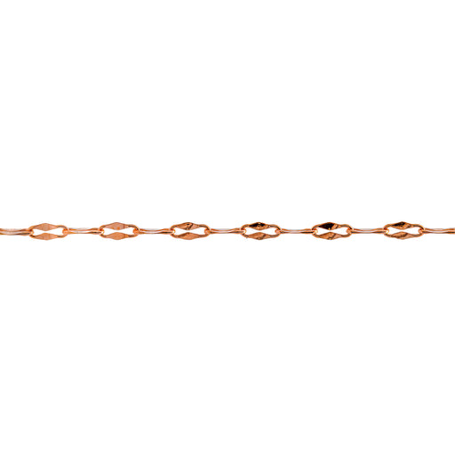 A close-up horizontal view of a yellow gold chain with repeating elongated diamond-shaped links that are a hammered paperclip design, set against a solid white background.