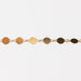 Gold bracelet with circular links on a white background