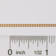 Curb chain being measured next to a ruler to show link size, spacing, and measurements