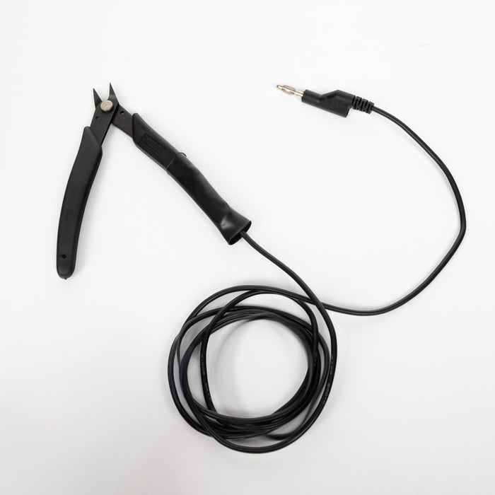 Black permanent jewelry pliers with a cable attached to ground welding electricity