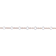 A close-up horizontal view of a delicate chain for permanent jewelry that features alternating small oval links in gfy and larger open diamond links in ss, shown against a plain white background.