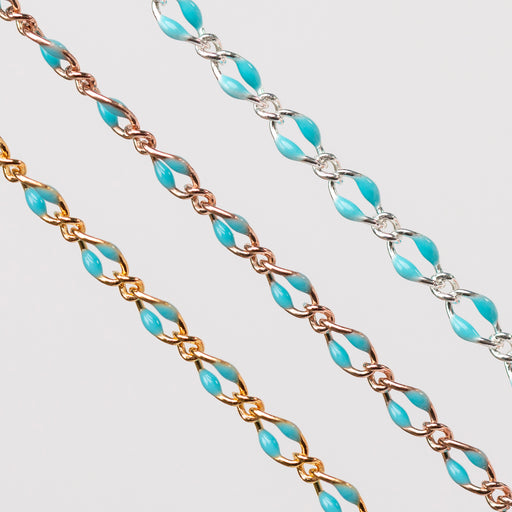 Three chains depicted all with blue enamel. One chain is yellow gold filled, one is rose gold filled, and the last is silver.