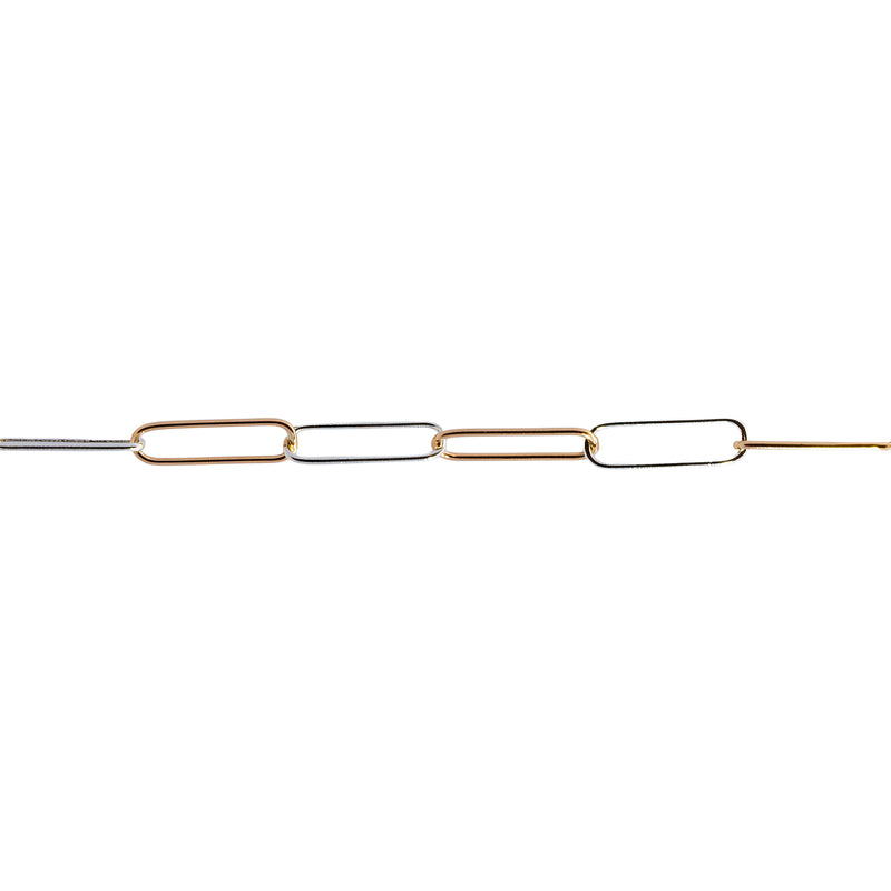 A permanent jewelry chain with alternating gold and silver paperclip links, shown horizontally against a plain white background.