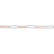A close-up of a mixed metal chain featuring alternating elongated links, with one side in textured yellow gold and the other side in smooth silver metal, set against a plain white background.