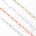 An assortment of Lucy Chain jewelry in various metals including sterling silver, gold filled yellow, gold filled white, and gold filled rose, displayed in parallel on a light background.