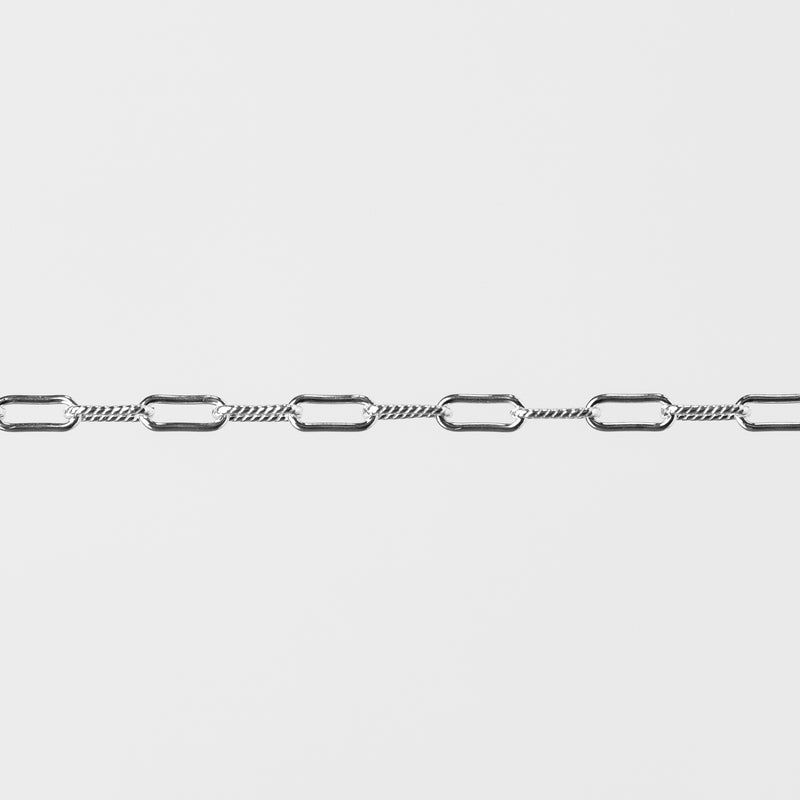 Silver paperclip chain on a white background