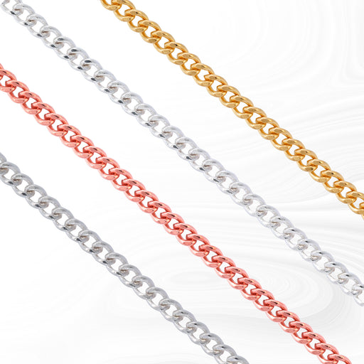 Four jewelry chains in different finishes, silver, gold, and rose gold, laid out flat.