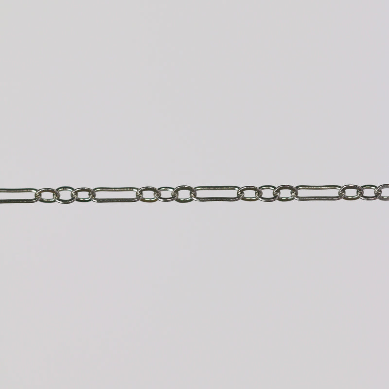 White gold chain for making permanent jewelry on a gray background