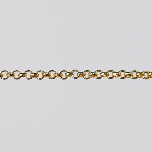 Round rolo chain for permanent jewelry over a gray background