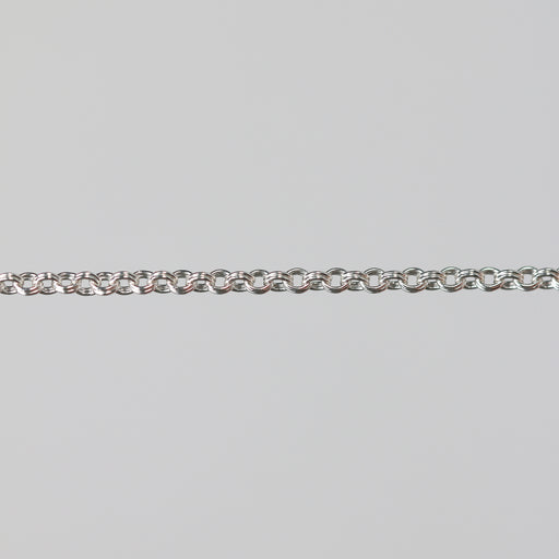 Silver double cable chain on a gray background