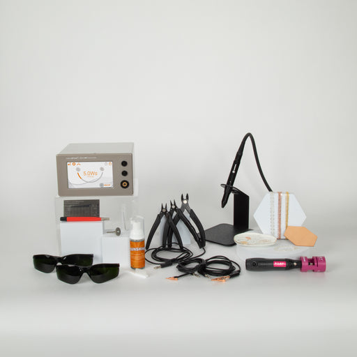 Collection of permanent jewelry equipment, supplies, and tools on a white background