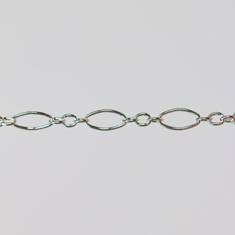 Elongated oval pj chain in sterling silver on a gray background