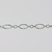 Elongated oval pj chain in sterling silver on a gray background
