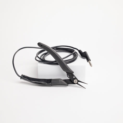 Black pliers with a coiled cable for grounding when welding on a white background