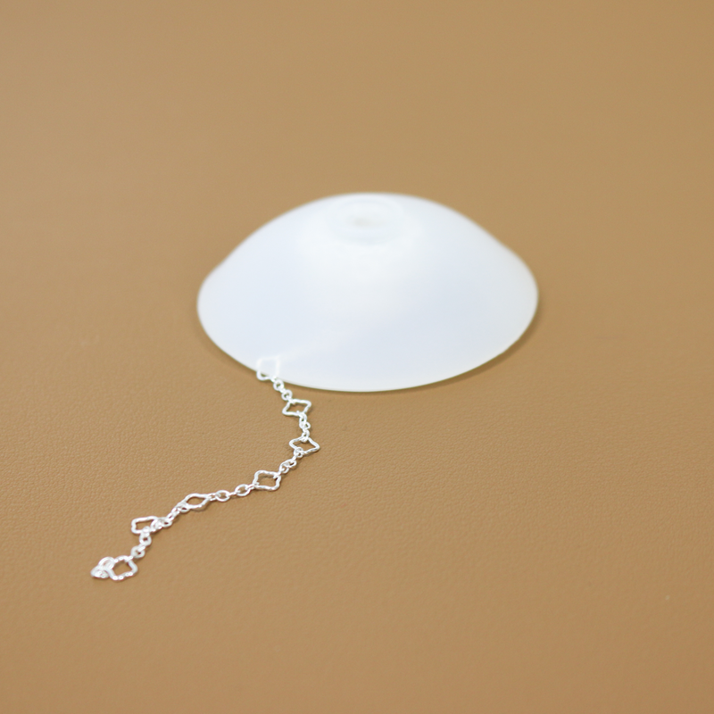 Closed protective portable case for holding permanent jewelry chains while still being able to use the chains.