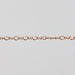 Rose gold chain pulled taut to show the links of the chain