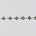 Silver bracelet with geometric star-shaped links on a light gray background