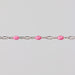 Silver chain with pink enamel on a light gray background