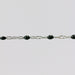 The silvia chain with black enamel on a gray background