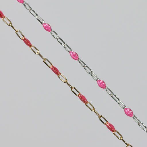Two cable chains side by side with pink enamel on them