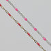Two cable chains side by side with pink enamel on them