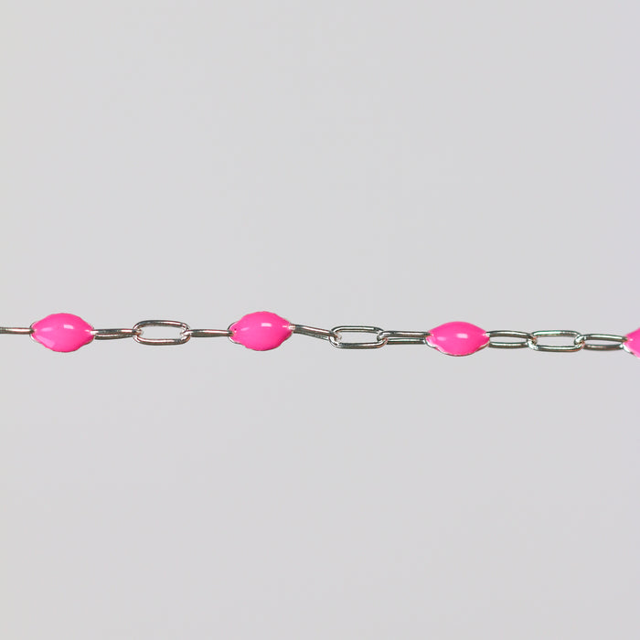 Sterling silver permanent jewelry chain perfect for welding over a gray background